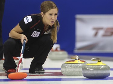 Kaitlyn Lawes reacts to a close-call shot from her mixed doubles partner John Morris during mixed doubles matches at the Continental Cup at the Markin MacPhail Centre in Calgary, on January 10, 2015. The final score was 8-5 for Team Canada.