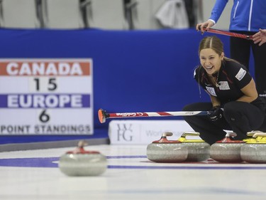 Kaitlyn Lawes laughs during her mixed doubles match with Johhn Morris at the Continental Cup at the Markin MacPhail Centre in Calgary, on January 10, 2015. The final score was 8-5 for Team Canada.