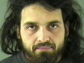 FILE - This undated file image provided by the Royal Canadian Mounted Police shows Michael Zehaf-Bibeau, 32, who shot a soldier to death at Canada's national war memorial day on Wednesday, Oct. 22, 2014. Radical Muslim Michael Zehaf-Bibeau killed a soldier outside Canada's parliament. Right-wing extremist Larry McQuilliams opened fire on buildings in Texas’ capital and tried to burn down the Mexican Consulate. Al-Qaida-inspired Michael Adebowale and an accomplice hacked an off-duty soldier to death in London. Police said the three perpetrators of recent attacks were terrorists and motivated by ideology. Authorities and family members said they may have been mentally ill. (AP Photo/Vancouver Police via The Royal Canadian Mounted Police, File)