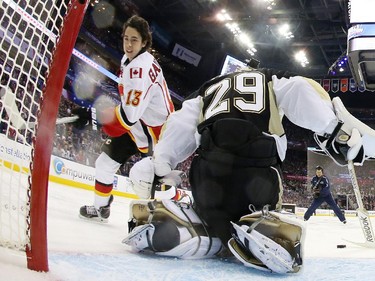 Johnny Gaudreau #13 of the Calgary Flames and Team Toews shoots against Marc Andre-Fleury #29 of the Pittsburgh Penguins and Team Foligno during the 2015 Honda NHL All-Star Skills Competition at the Nationwide Arena on January 24, 2015 in Columbus, Ohio.