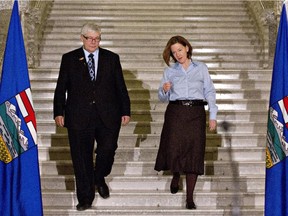 In March 2013, then deputy premier Dave Hancock and Alberta Premier Alison Redford made their way to a press conference at the legislature to announce Redford's resignation.