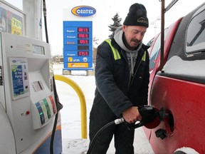 Rob Baker filled his truck with gas at the Centex station in Inglewood on January 5, 2015 as gas prices continued to sit in the 80 cents per litre range.