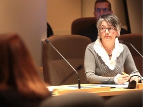 Councillor Druh Farrell listened as other member of Calgary's City Council debated the use and possession of alcohol by councillors during a committee meeting on January 20, 2015.