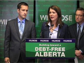 Then-Wildrose MLA Rob Anderson, leader Danielle Smith and MLA Drew Barnes talk about the provincial budget early in 2014.