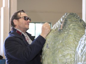 Bill Paxton signs an Aliens egg at the 2014 Calgary Expo. He, and the rest of the reunited cast of Aliens, signed the egg and it is now being auctioned off on eBay to raise funds for the medical needs to 10-month-old Sawyer Kai of Calgary.