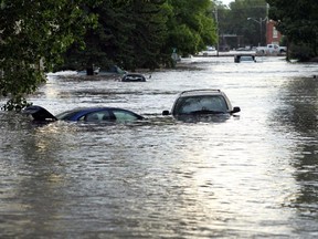 On June 20, 2013 this street with the Wales Theatre in the background was under several feet of water.