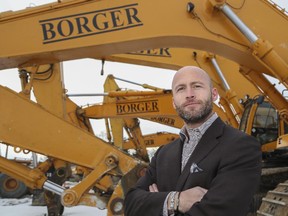 Bill Borger, president and CEO of the Borger Group of Companies, by some company machinery in Calgary, on January 19, 2015.