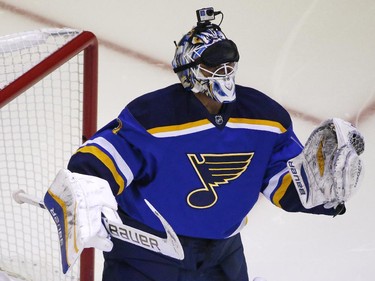 St. Louis Blues goalie Brian Elliott, a member of Team Foligno, wears a blindfold while participating in the breakaway contest during the NHL All-Star hockey skills competition in Columbus, Ohio, Saturday, Jan. 24, 2015.