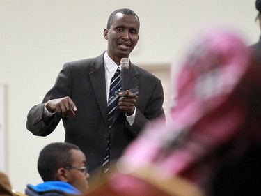Dr. Abdulahi Omar, a researcher and educational consultant, speaks with members of the Calgary Somali community at the Abu Bakr Musallah mosque on Saturday evening January 10, 2015. The meeting was held to help find ways to counter recent violence within the Somali community.