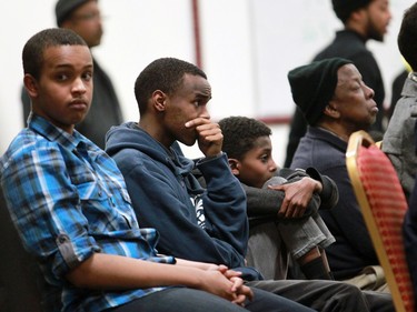 Members of the Calgary Somali community listen to a meeting held at the Abu Bakr Musallah Mosque on Saturday evening January 10, 2015.