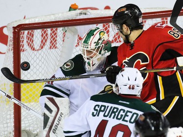 Calgary Flames forward Josh Jooris couldn't quite get this shot past Minnesota Wild goaltender Devan Dubnyk during the first period of NHL action at the Scotiabank Saddledome on Thursday Jan. 29, 2015.