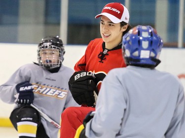 Calgary Flames star rookie Johnny Gaudreau practised with the Blackfoot Chiefs Atom 5 team after surprising them in their dressing room at the Acadia Recreation Centre Friday night. The event sponsored by Bauer also included all the team receiving Bauer hockey sticks.