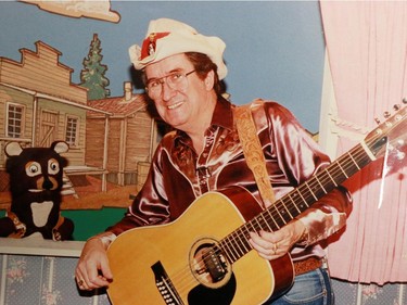 Ron Barge as Buck Shot with Benny the Bear on CFCN's The Buck Shot Show, circa 1990.
