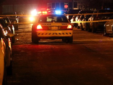 Police at the scene of a multiple shooting in Calgary on January 1, 2015.