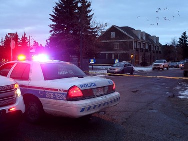 Police at the scene of a multiple shooting in Calgary on January 1, 2015.