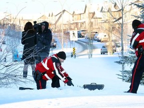 City Police are investigating a snowmobile crash that left one person in life-threatening condition at Silverado Way and Sheriff King Street S.W. early Sunday, January 11, 2014.