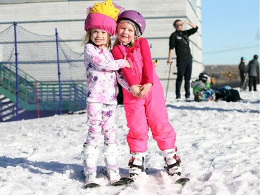 Friends Kate Ford and Kirra Pardy, both 5, put on their funnest pink outfits for a day of skiing  at Canada Olympic Park on Sunday.