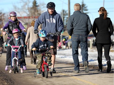 The Stewart family, mom Candace, dad Kyle, daughter Maya, 6, and son Reid, 4, braved the crowed paths at Edworthy Park for a bike ride as the weather on January 25, 2015 reached 17 C.