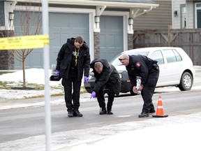 Police are investigating a suspicious death after a man was found dead on an Auburn Bay street following reports of gunfire.