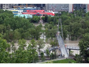 A high view of the flooding at Bow River shows a closed bridge and water covered an island next to the downtown core, in Calgary, Alberta, Canada June 22, 2013.