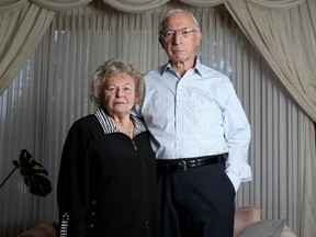 Holocaust survivors Bronia and Sid Cyngiser pose for a photo at their home in Calgary on January 29, 2014.