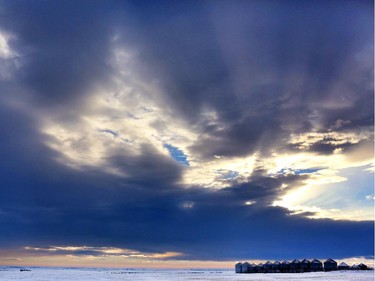 A chinook blows in as the sun sets near Carbon, Alberta on January 7, 2015.