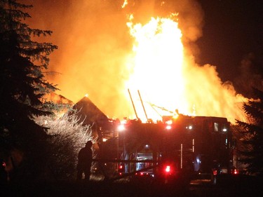 Chestermere Fire Fighters had their hands full with a fully engulfed house fire at the intersection of Highway 1 and Paradise Road on January 29, 2015.