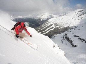 A skier enters the Delirium Dive area at Sunshine Village in Banff.