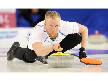 Team Europe's Niklas Edin delivered his rock during the opening round of team action against Team Canada's Brad Jacobs in the Continental Cup at the Markin MacPhail Arena at Winsport January 8, 2015.
