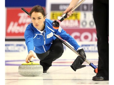 Team Europe curler skip Anna Sidorova delivered her stone during her game against Team Canada's Val Sweeting during the opening round of team action in the Continental Cup at the Markin MacPhail Arena at Winsport January 8, 2015. Europe won the match.