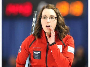 Team Canada skip Val Sweeting called to her sweepers in her game against Team Europe's Anna Sidorova during the opening round of team action in the Continental Cup at the Markin MacPhail Arena at Winsport January 8, 2015.