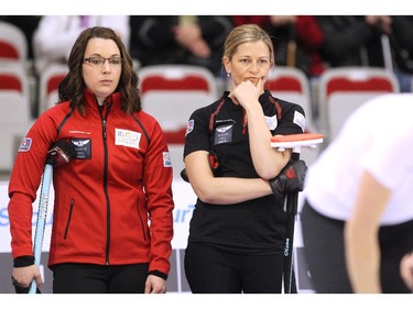 Team Canada curlers Val Sweeting, left, and Lori Olson-Johns watched a shot during her game against Team Europe's Anna Sidorova during the opening round of team action in the Continental Cup at the Markin MacPhail Arena at Winsport January 8, 2015.