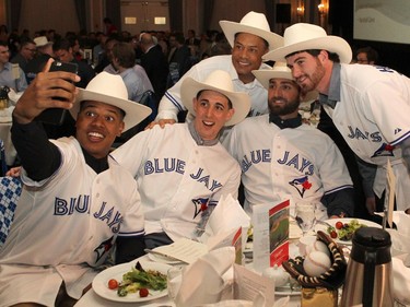 The Blue Jays including current players Marcus Stroman, Aaron Sanchez, Drew Hutchison, Kevin Pillar  and former Blue Jay Roberto Alomar in behind took a selfie after getting white hatted at the Calgary Baseball Luncheon in support of the Okotoks Dawgs Youth Baseball Academy and amateur baseball in Alberta.