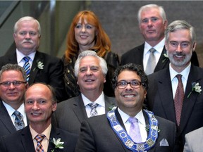 Naheed Nenshi, seen with some of his councillors after the 2013 election.