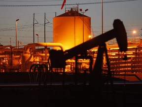 Pump jacks and wells are seen in an oil field on the Monterey Shale formation.