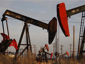 Pump jacks and wells are seen in an oil field on the Monterey Shale formation.