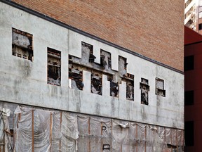 The side of downtown Calgary’s Len Werry building where The Calgary Herald gargoyles once resided.