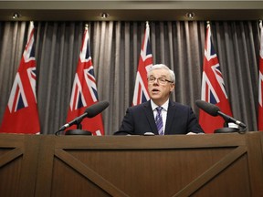 Manitoba Premier Greg Selinger reads his government's Speech From The Throne  in November. Reader says Albertans should learn from Manitoba's tax policies.