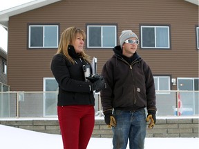 Donna Hunter and Codey Stenabaugh are neighbours who own Rivers Edge condos in High River's Wallaceville area and have so far refused the buyout packages from the provincial government. Stenabaugh is one of the last residents living in the neighbourhood.