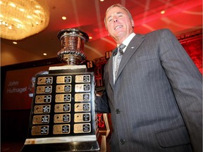 Calgary Stampeders' head coach John Hufnagel wins the CFL Coach of the Year award at a banquet in Winnipeg on Wednesday.