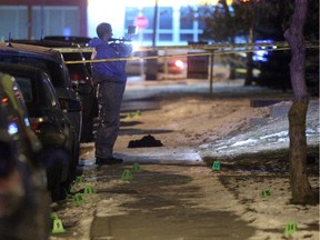 A member of the Calgary Police Service forensic unit video taped the scene of Calgary's first murder of the year on January 1, 2015. Police were called to a home in Killarney where they found multiple people shot in the residence. One later died at the hospital.