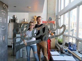Lacey Haskell and Brett Kostka with a work-in-progress that demonstrates their skill and serves as a sort of mission statement for HK Lux Co.