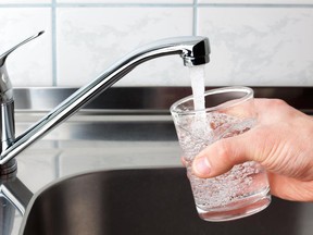 Local Input~ Hand holding a glass of water poured from the kitchen faucet.
Local Input~***National Post use only***No Postmedia***
Water for Fluoride story
Credit: Fotolia