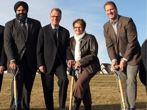 Infrastructure Minister Manheet Bhullar (left to right), Education Minister Gordon Dirks, Catholic board chairwoman Linda Wellman and MLA RIck Fraser helped to turn the sod for new schools in Calgary during the October byelection campaign.