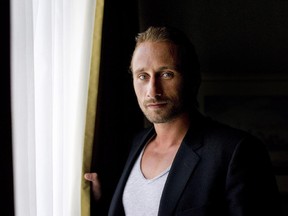 Matthias Schoenaerts poses for a photo while promoting his new movie "Rust and Bone" during the 2012 Toronto International Film Festival in Toronto on Thursday, Sept. 6, 2012.