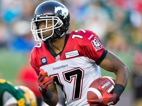 Maurice Price runs with the ball as the Stampeders faced the Edmonton Eskimos on Sept. 6, 2014.