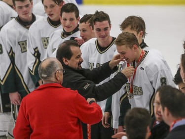 The Northstar Blazers receive their gold metals after winning Midget AA finals of the ESSO minor hockey week in Calgary, on January 17, 2015.