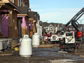 Calgary's new home builders and developers expect dropping oil prices to affect the local housing market.