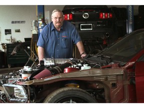 Owner Dale Adams in his shop which recently has become one of three authentic Shelby Mod Shops in Canada. The shop specialized in transforming Ford Mustangs bought in Canada into Shelby Super Snakes modified to Shelby specifications.