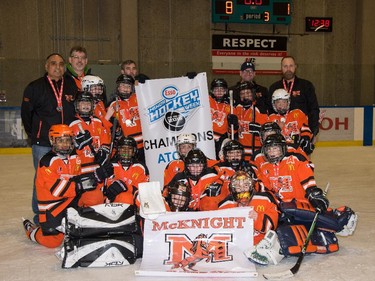 Mcknight Mustangs Atom 9 champions in the 2015 Esso Minor Hockey Week.